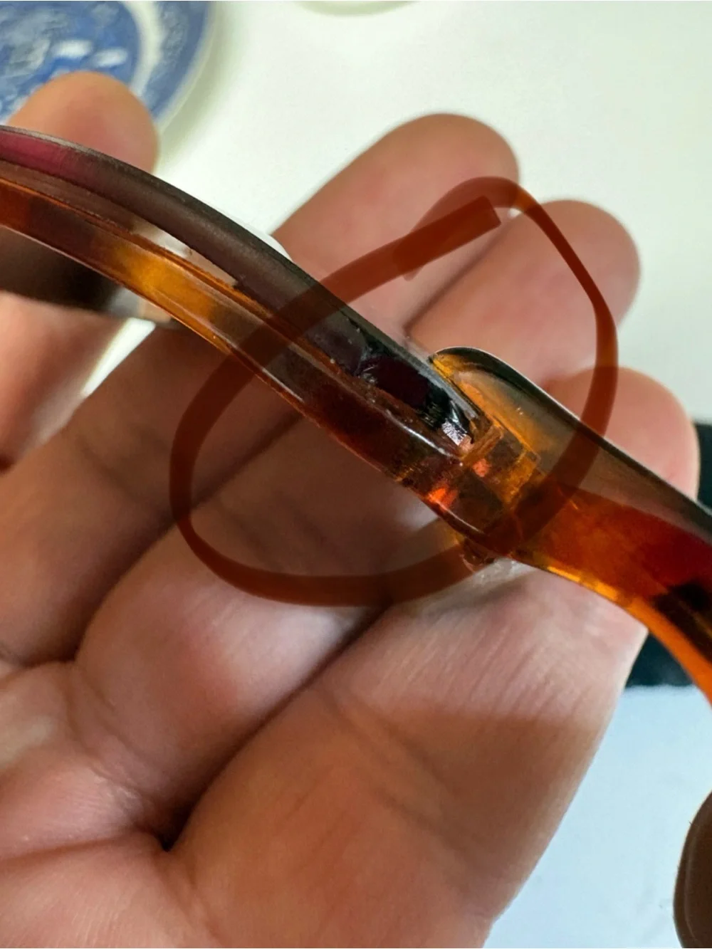 Please see the pictures one of the lenses little small piece missing,